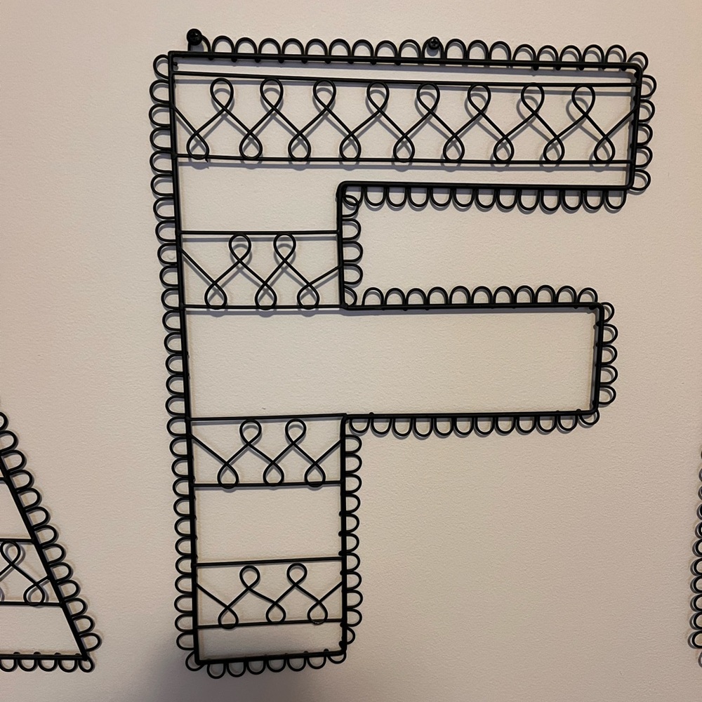 “F” wall hanging for notes/pictures.